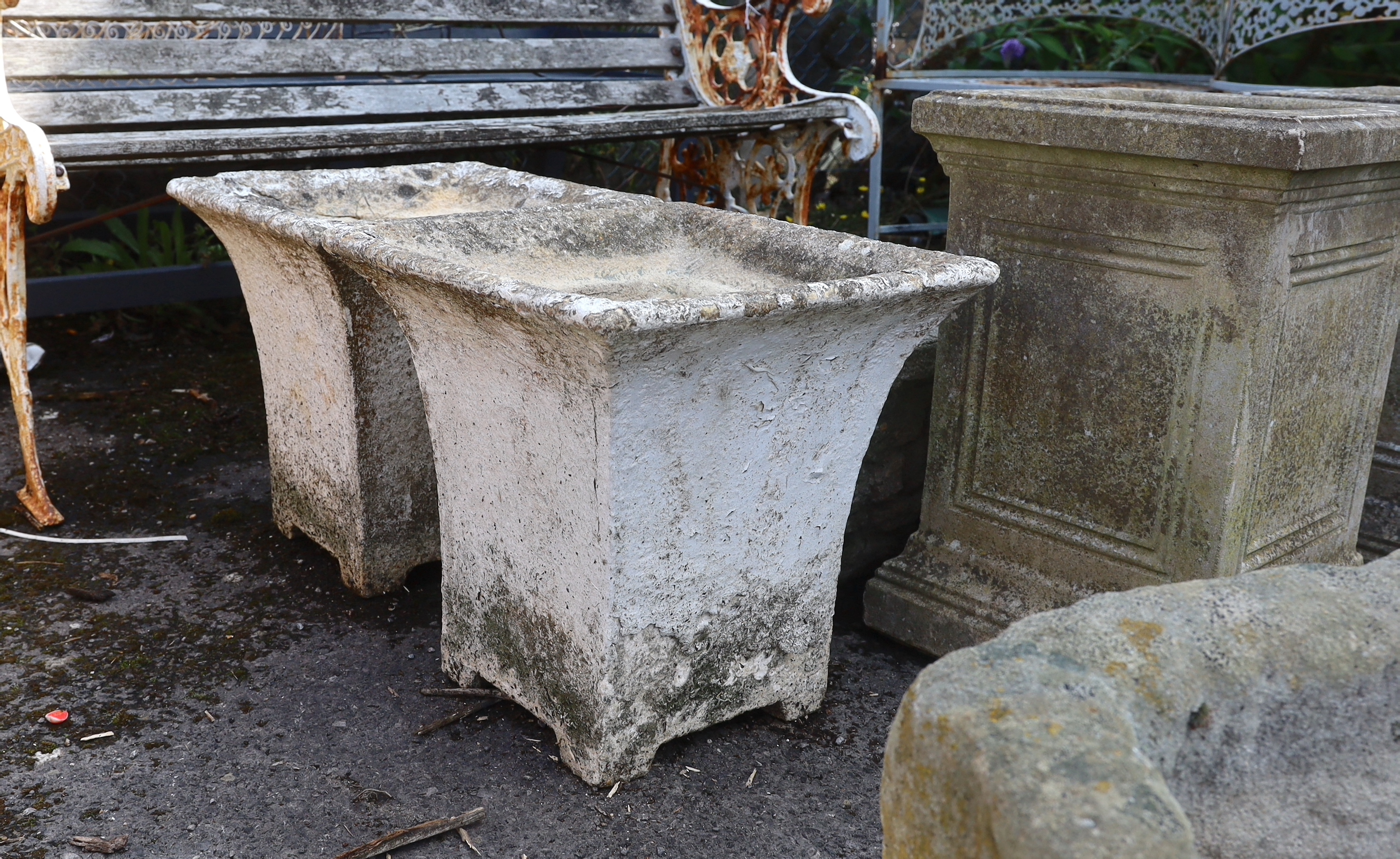 Eight assorted reconstituted stone garden planters, largest height 49cm
